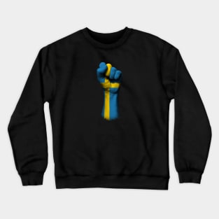 Flag of Sweden on a Raised Clenched Fist Crewneck Sweatshirt